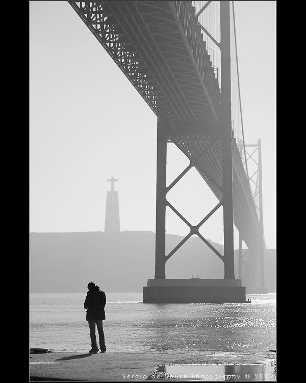 The Man,the Bridge and the "Cristo Rei"