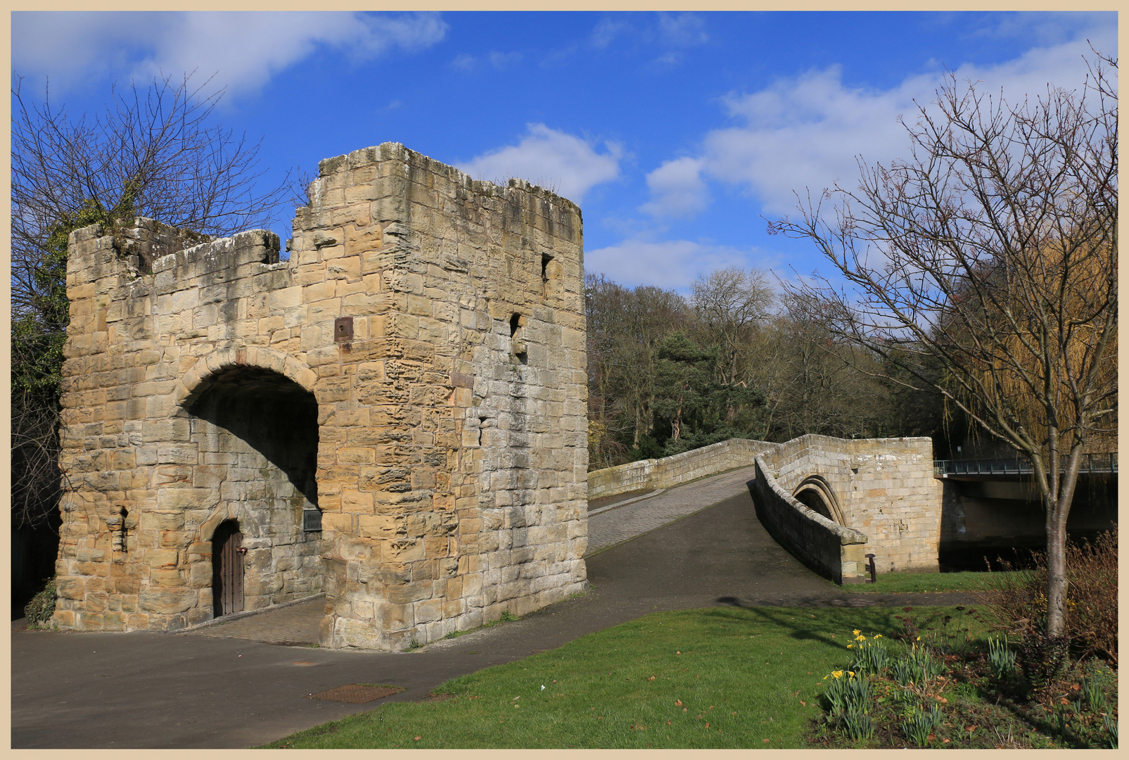 the medieval bridge and gate at warkworth