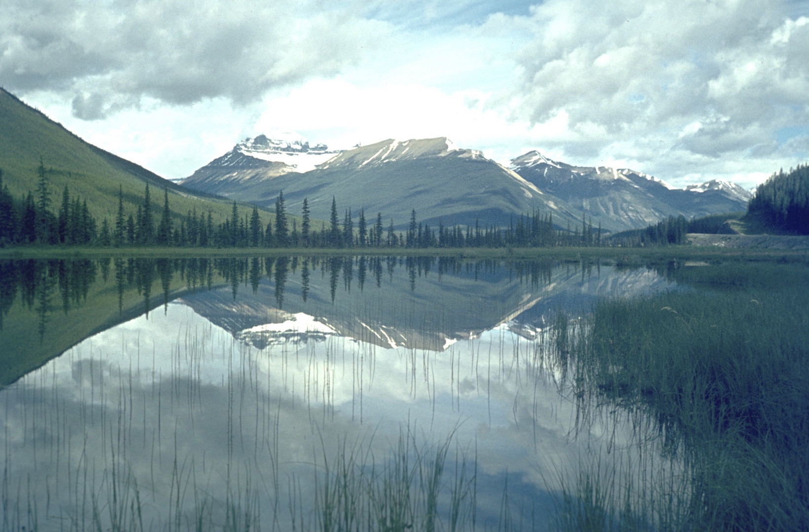 the mountains were reflected in the lake.