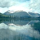 the mountains were reflected in the lake.