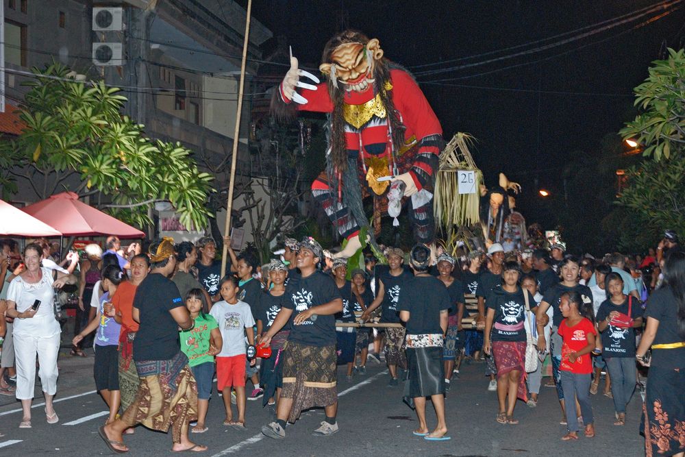 The Nyepi procession passes
