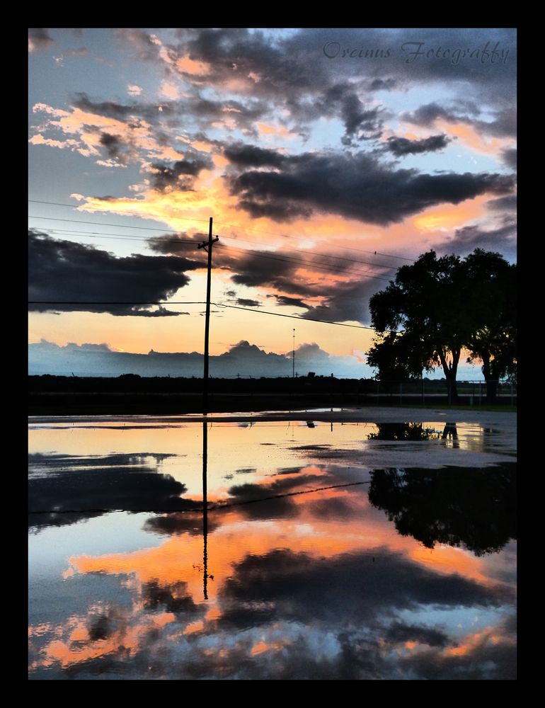 The Puddles And The Sunset