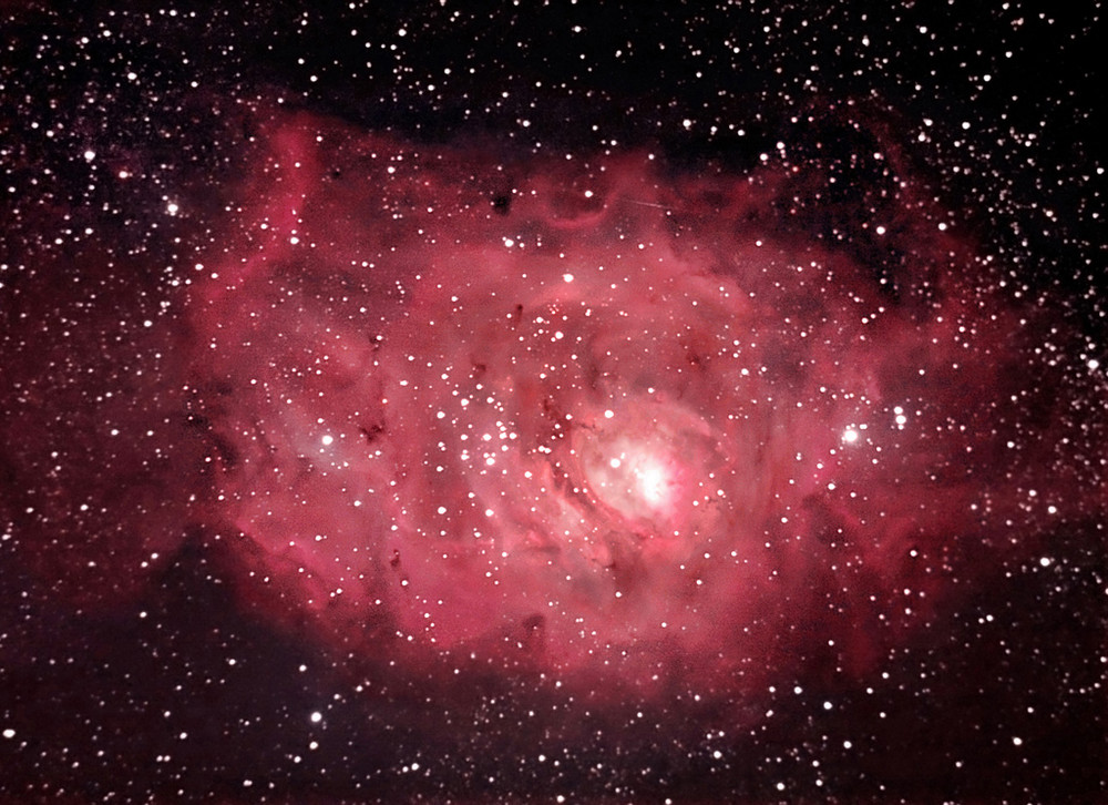 The red Lagoon in the dark sky