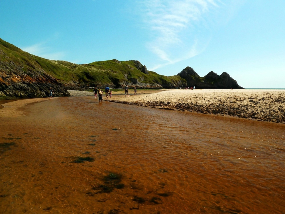 The river running down to the beach