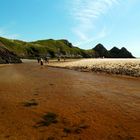 The river running down to the beach