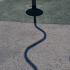 The shadow of  playing equipment on park