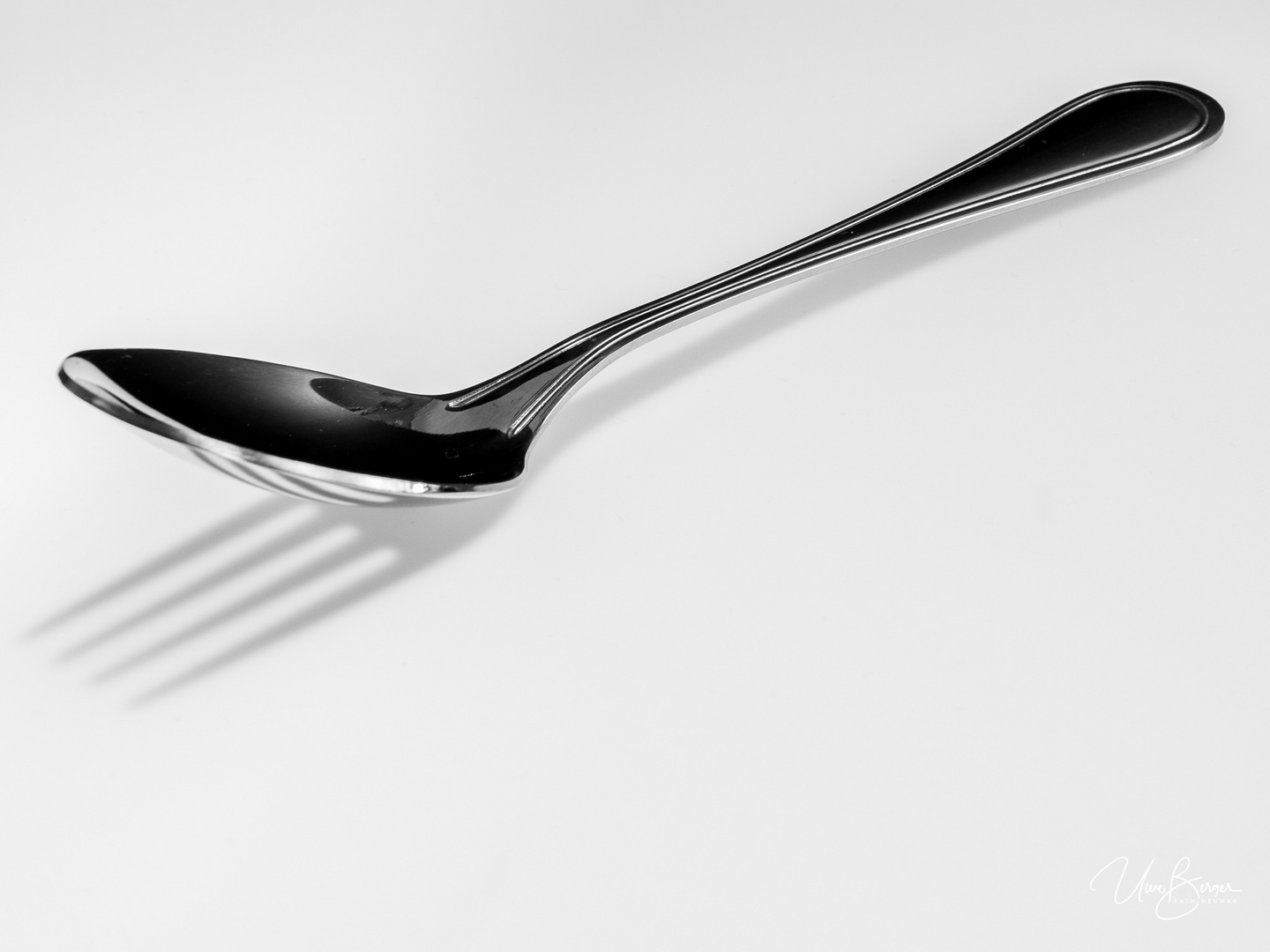 The spoon and its shadow