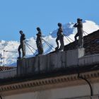 The statues on the roof