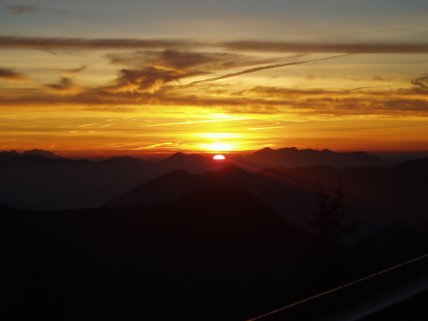 The Sun is going down in the bavarian Mountain