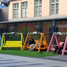 The swings on shopping center yard