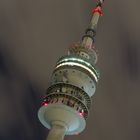 The Tower And The Moving Moon Clouds