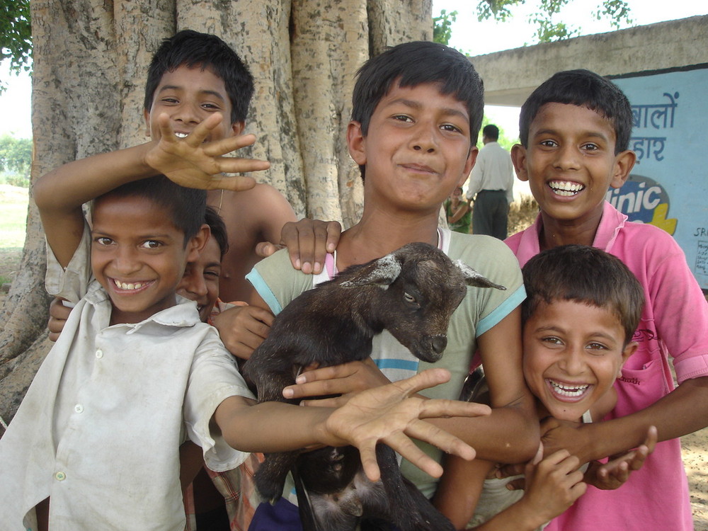 the village children with their goat