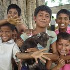 the village children with their goat