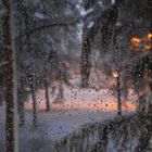 The wet window after snow rain