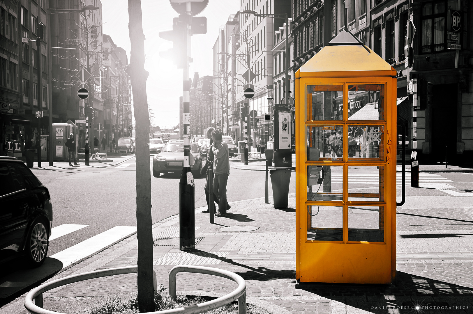 This is a yellow phone booth