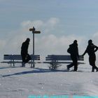 Three black guys in snow white winter landscape II