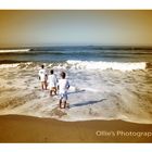 Three boys on a beach