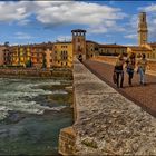 Three friends on the deck of the river Adige.