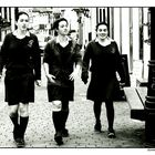 three girls in school uniform