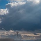 Three girls with dramatic sky