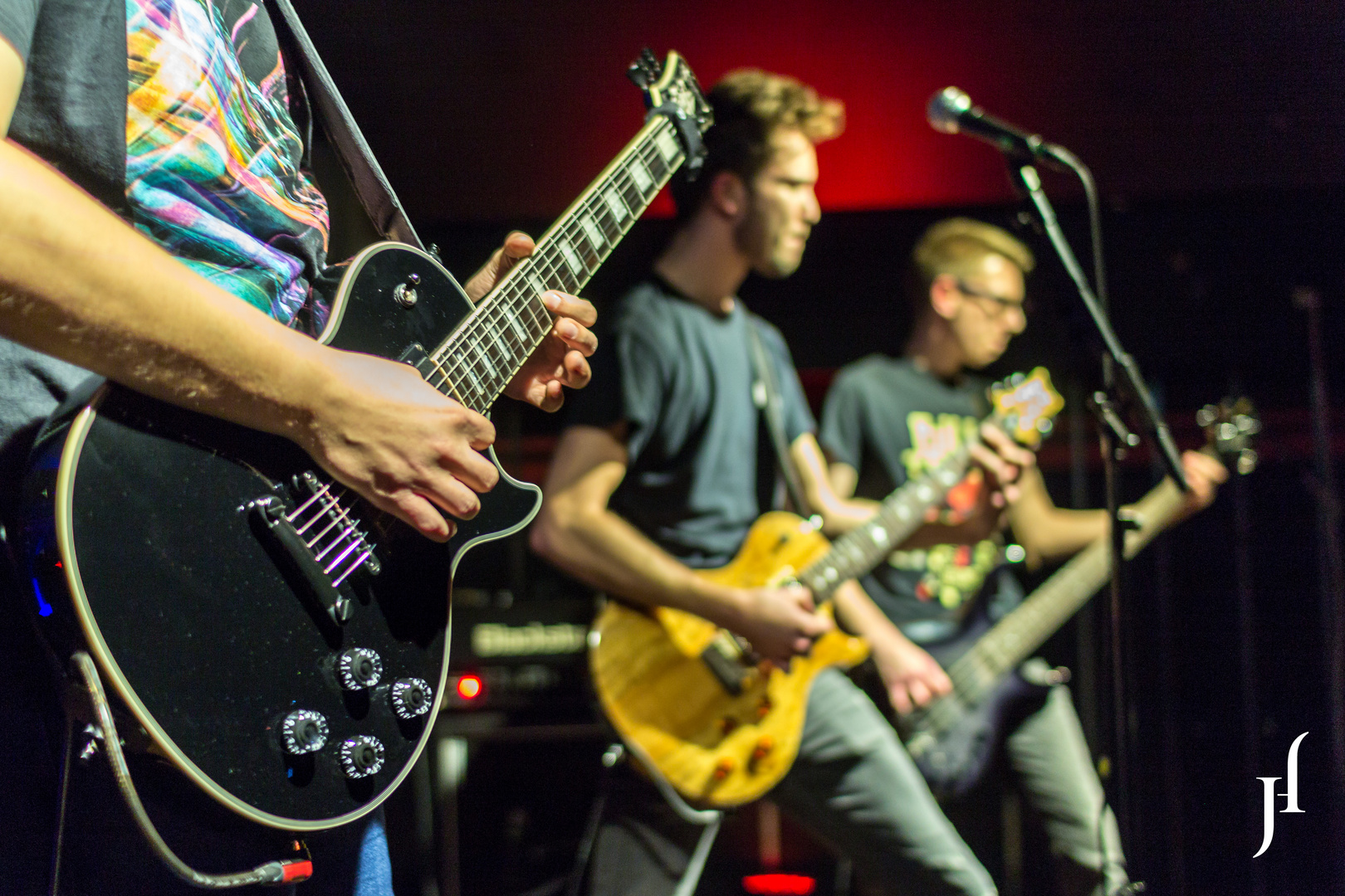 Three guitars in a row