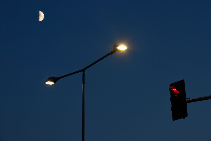 Three lamps and a traffic light