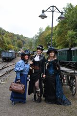 " three pretty ladies waiting for the train "