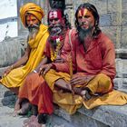 Three Saddhus present themselves for photo shoots