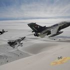 three-ship over white sands