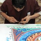 Tibeter beim erstellen eines Sandmandala auf der Weitsicht 2011