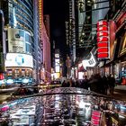 Times Square at night in the rain