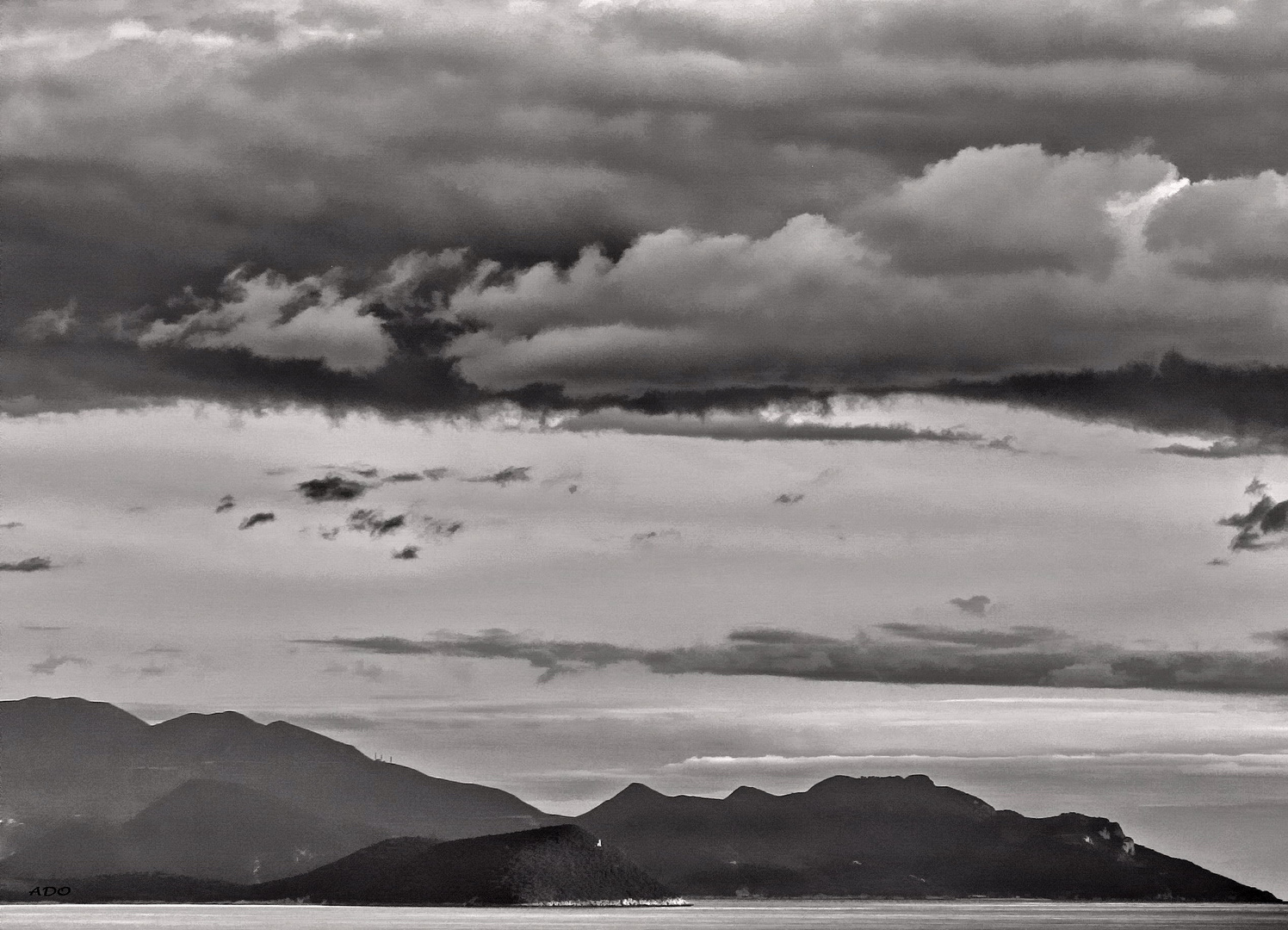 Tiny Lighthouse, Massive Clouds