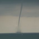Tornado y barco