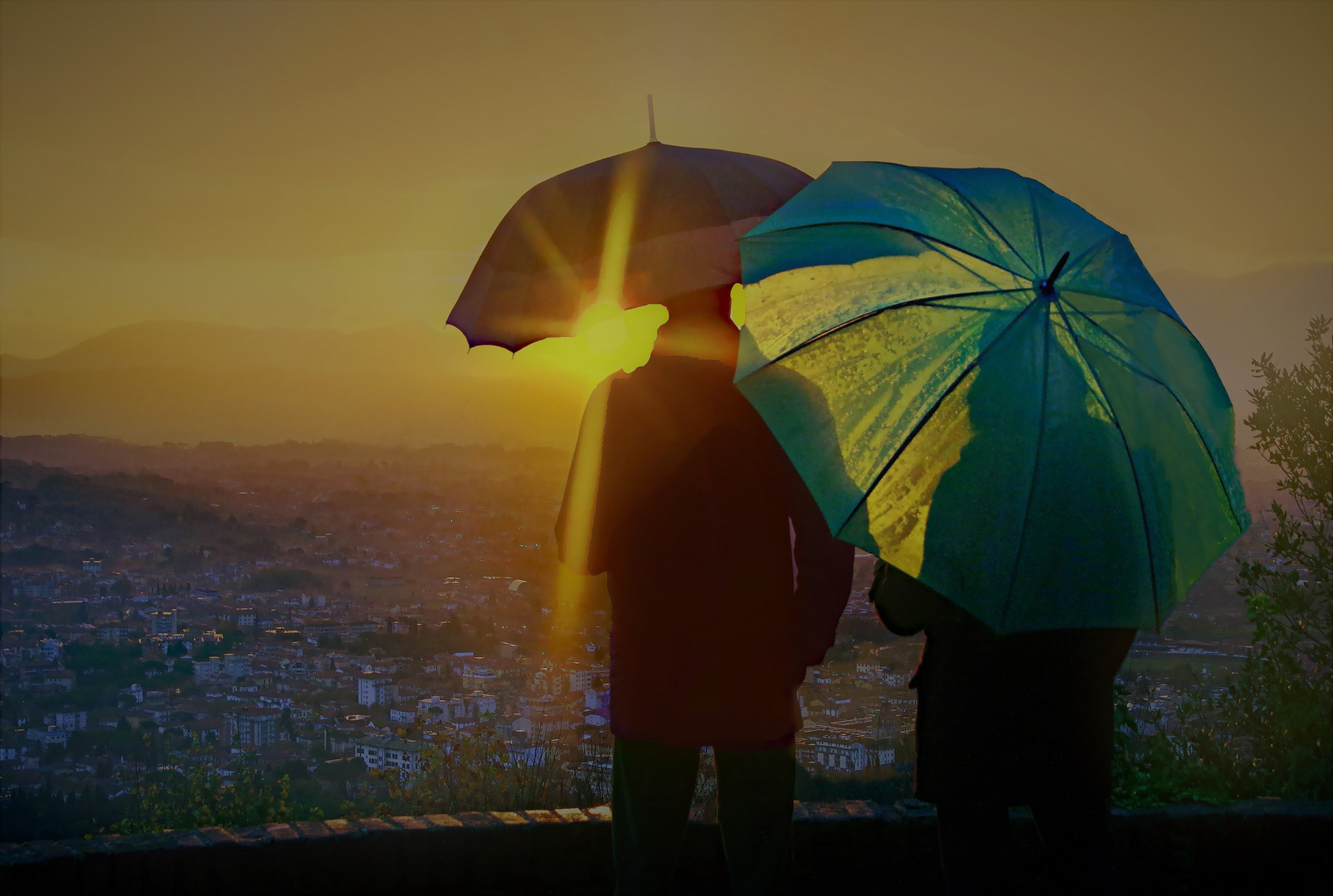  tour  à tour parapluies ou ombrelles ... selon les caprices du temps!