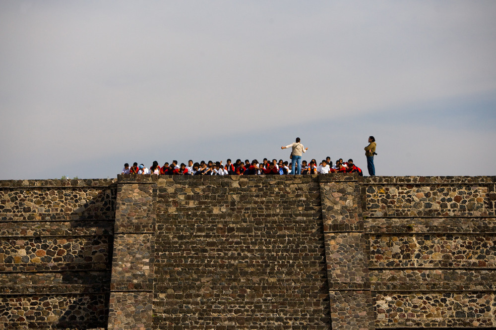 Tourist group on top of pyramid in Teotihuacán