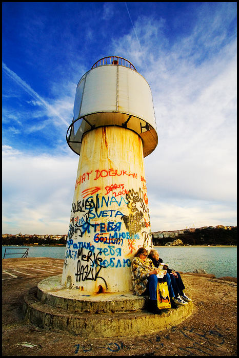 Tourists by the Lighthouse