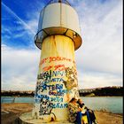 Tourists by the Lighthouse