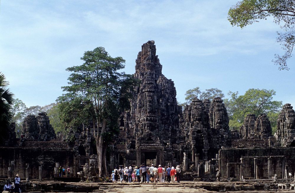 Tourists in Bayon, Angkor, Cambodia