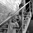 Township kids on stairs