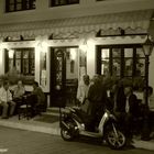 traditional greek coffeehouse in the evening