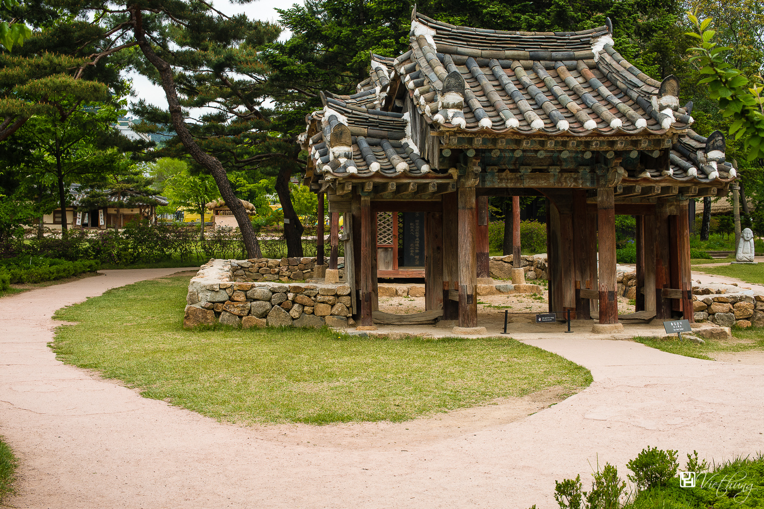 Traditional Korean gate and stone fence