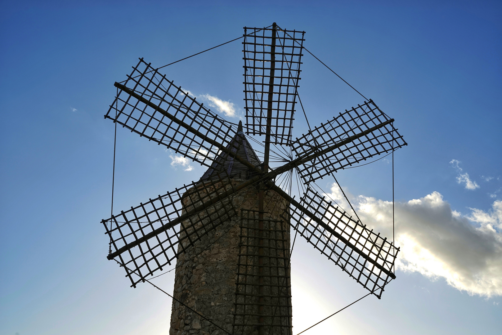                                traditional mallorca windmill in front of blue sky