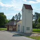 Trafostation - alte Freileitungsstation vor moderner Kabelstation