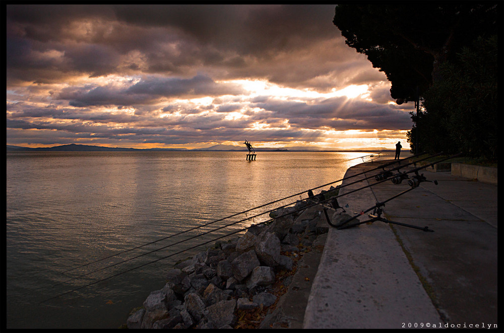 tramonto con pescatore