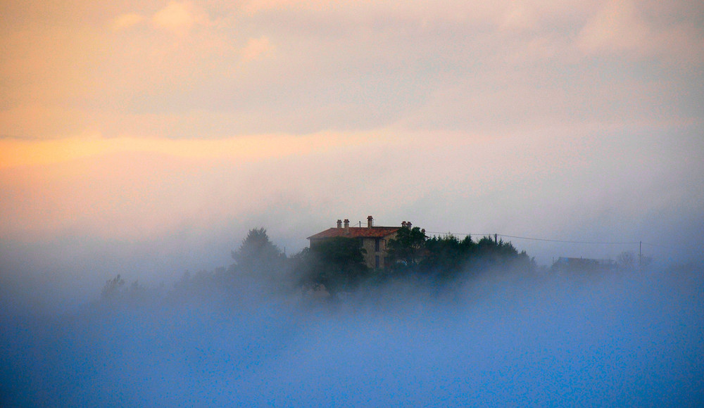 Tramonto nella nebbia