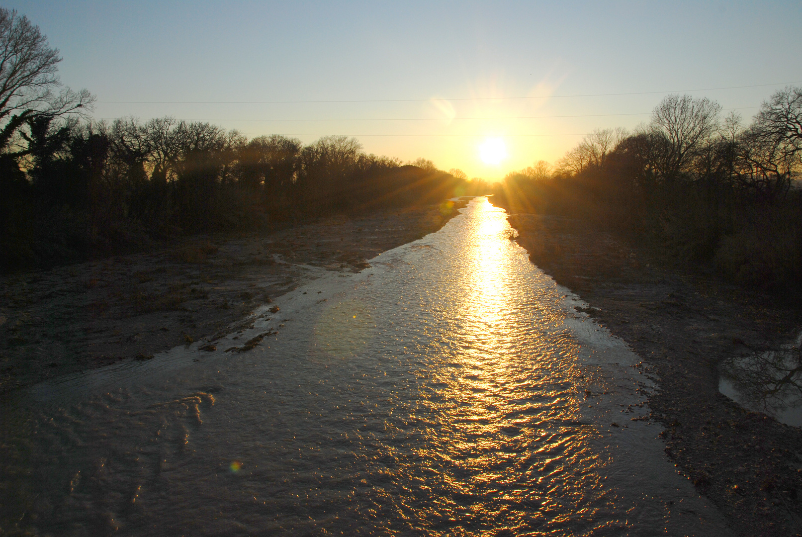 Tramonto sul fiume Tenna