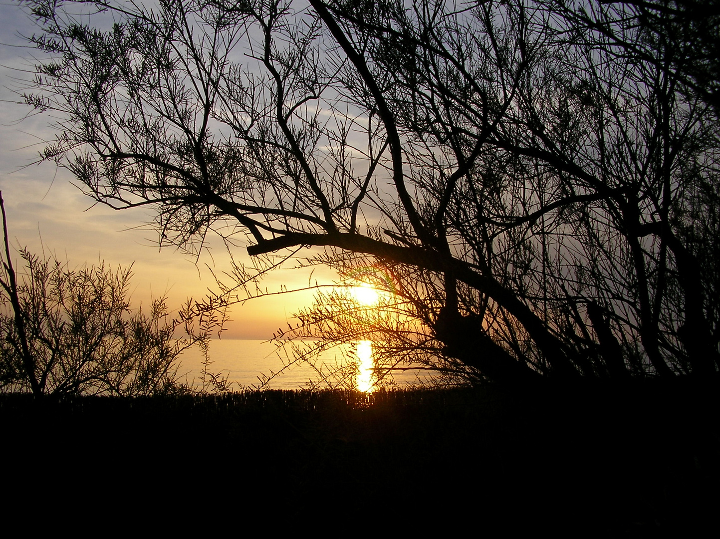 tramonto sul tombolo