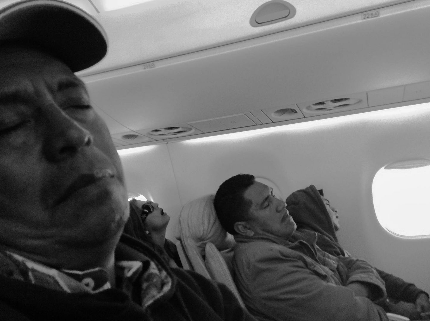 Travelers - on an early flight from Guatemala to Mexico City