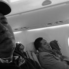 Travelers - on an early flight from Guatemala to Mexico City