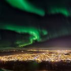 Tromsø - Nordlichter über der Stadt 